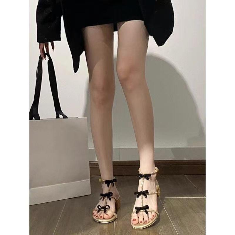 Bow sexy Roman sandals female 2025 summer word with golden rhinestones fairy wear fashion new