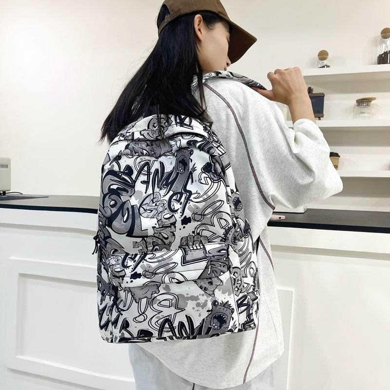 i new high-value personalized graffiti cool backpack junior high school students contrasting color backpack