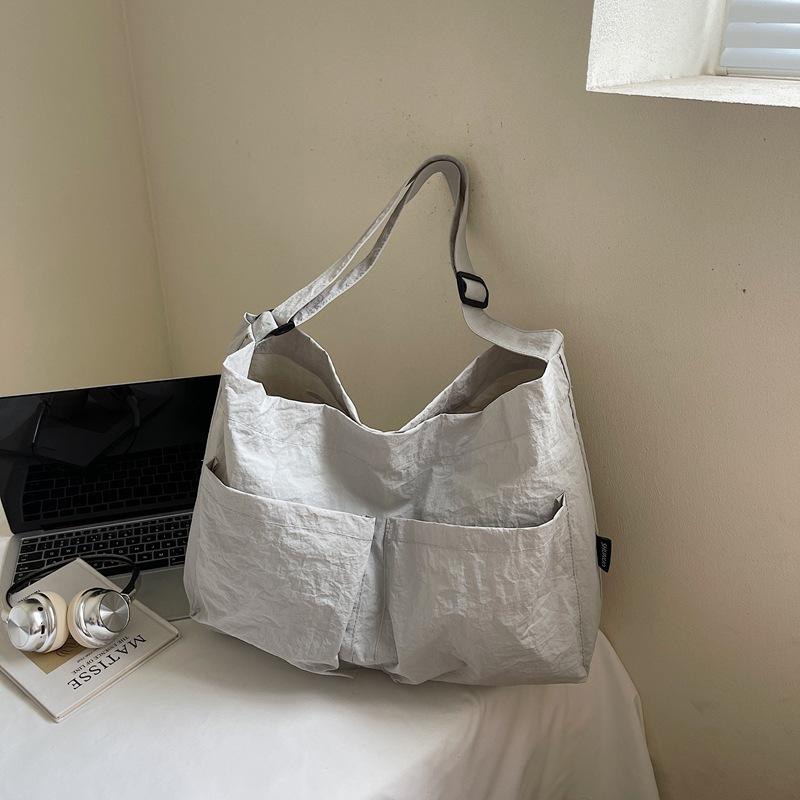 

Retro tooling style women s shoulder bag crossbody bag summer new canvas bag street large-capacity literary and leisure bag