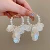 French Luxury Petal Pearl Earrings: Elegant Design with Long Tassels and Versatile Hoops.