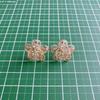 Used Filigree flower design earrings without catch