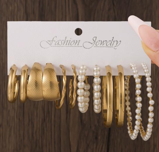 European and American new earrings set 1 pair of golden metal twist pearls creative retro simple and versatile earrings