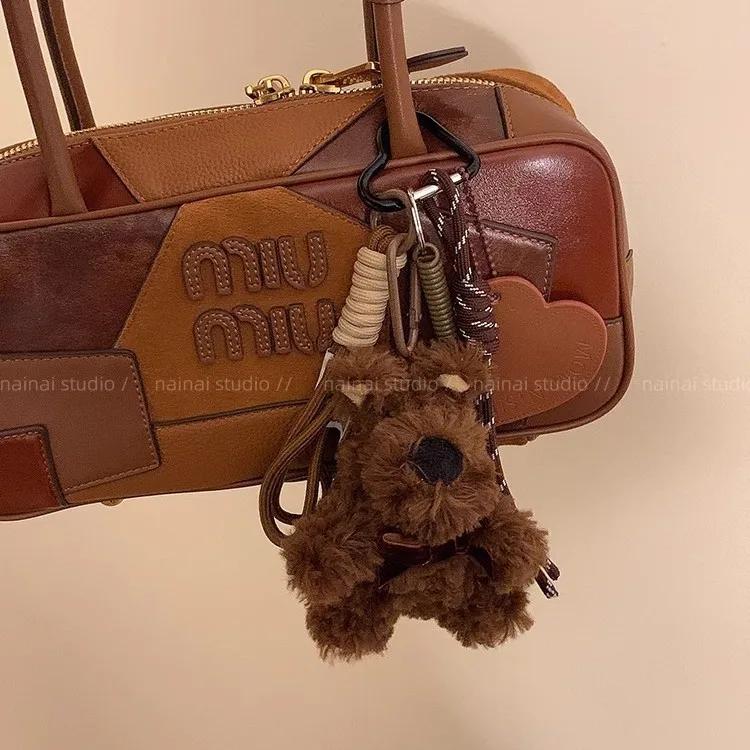 

Cute puppy Glasses clip Key Chain bowknot Pendant Hand woven rope Backpack decoration