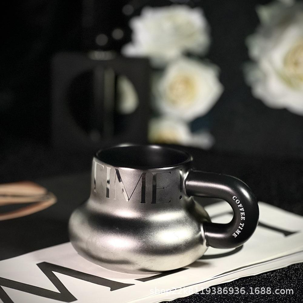 

Creative Dun Dun Cup Big Belly Cup Ceramic Mug Chubby Handlebar Cup High Value Titanium-Plated Dark Silver Scrub 350ml срібний