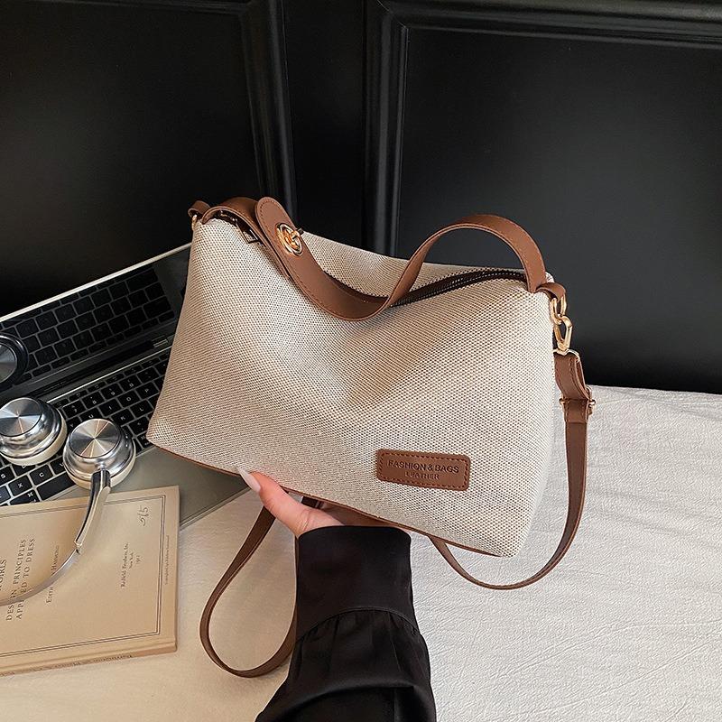 Niche design bag women's bag large capacity messenger bag knitted cloth shoulder armpit bag