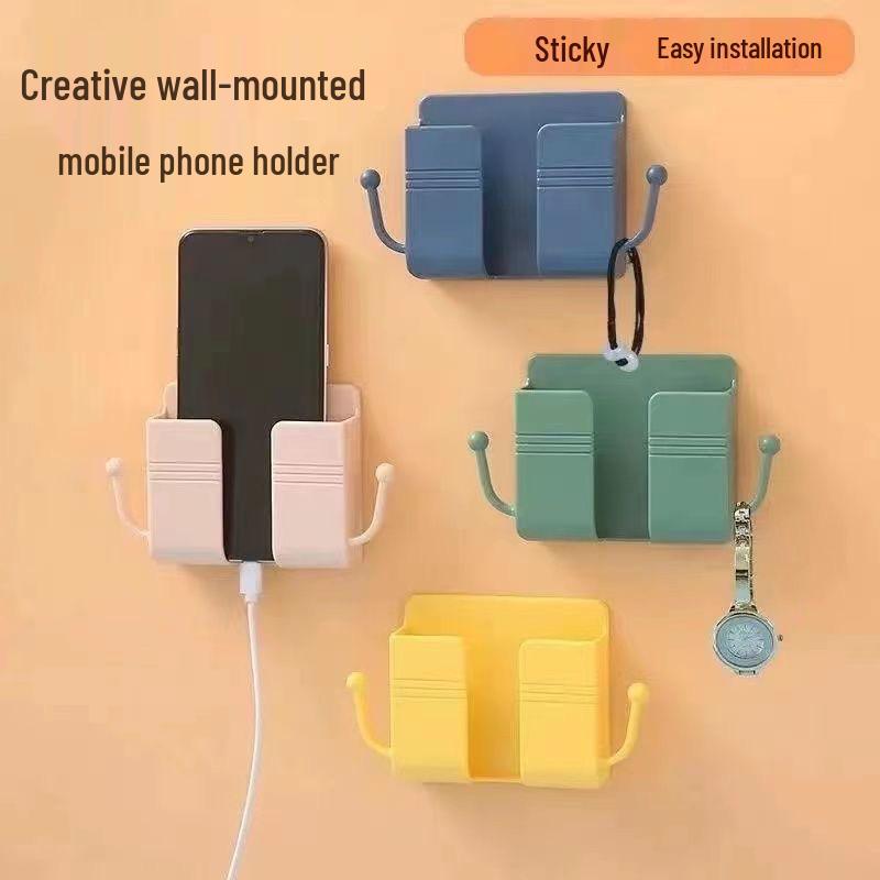 Wall-Mounted Charging Holder: Adhesive Phone Bracket for Bathroom, Kitchen, and Bedside Storage.