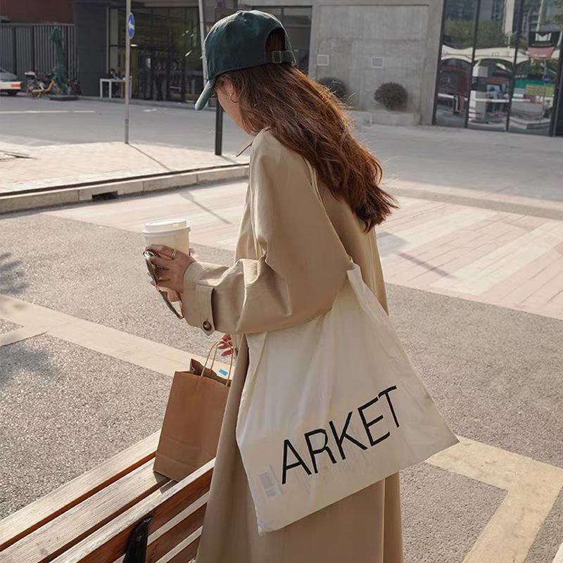 

ins niche design literary and simple letters thin cotton grey cloth bag canvas bag shoulder bag shopping bag school bag
