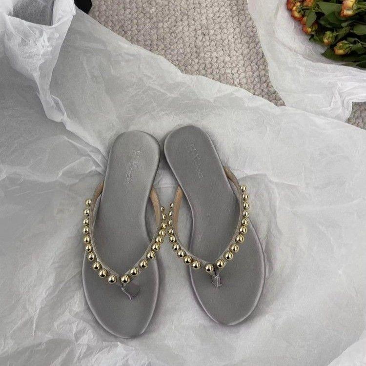 2025 summer new fashion Korean version of flat-bottomed flip-flops women's outer wear pinch slippers soft-soled non-slip beach shoes tide