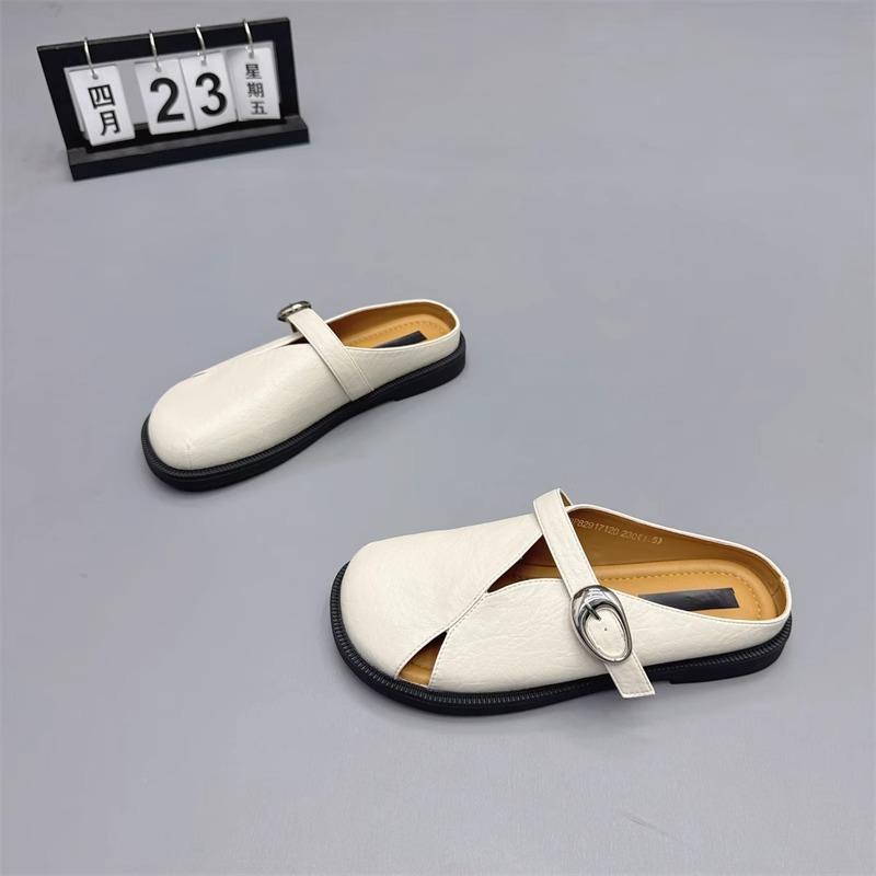 

Кожаная сумка голова полые тапочки женские летние новые для улицы на плоской подошве ленивые на плоском каблуке универсальные однословные крутые тапочки 40