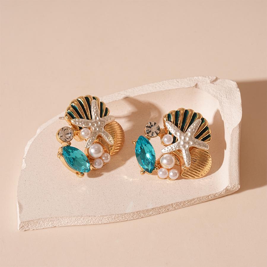 

Ожерелье-подвеска с бриллиантами и жемчугом, вдохновленное океаном, с акцентами в виде морской звезды, ракушки и коралла