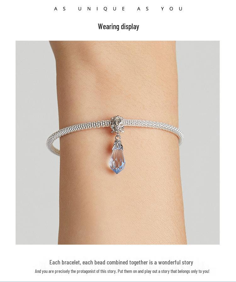 Sterling Silver Snowflake Ice Crystal Pendant Bracelet with Light Blue Zircon and Platinum Plating