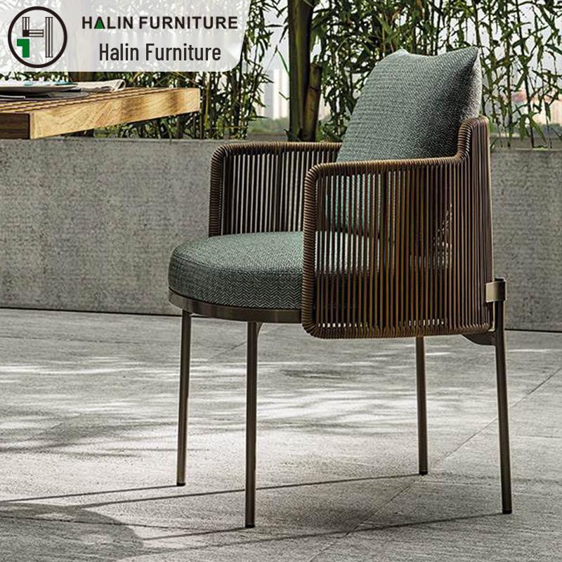 Outdoor Rattan Dining Set: Long Table with Casual Woven Chairs for Garden, Terrace, or Courtyard.