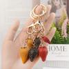Rhinestone Strawberry Keychain: Cute Fruit Bag Charm & Light Luxury Metal Pendant for Women’s Car Keys