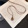 Korean Brushed Pendant Necklace: Women's Long, Versatile Black Cord Sweater Chain