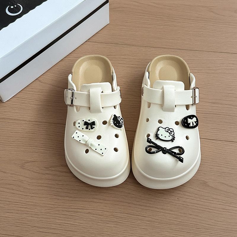 

Милые мультяшные кошачьи туфли-пряжки с отверстиями для женщин, летняя новинка, верхняя одежда, сумка, тапочки, пляжные сандалии 39-40