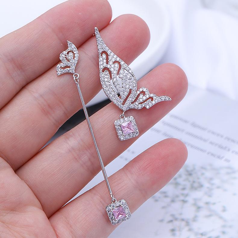 

Корейская версия темпераментных серег с желтым бриллиантом S925 серебряная игла индивидуальный дизайн длинные крылья AB асимметричные серьги-бабочки