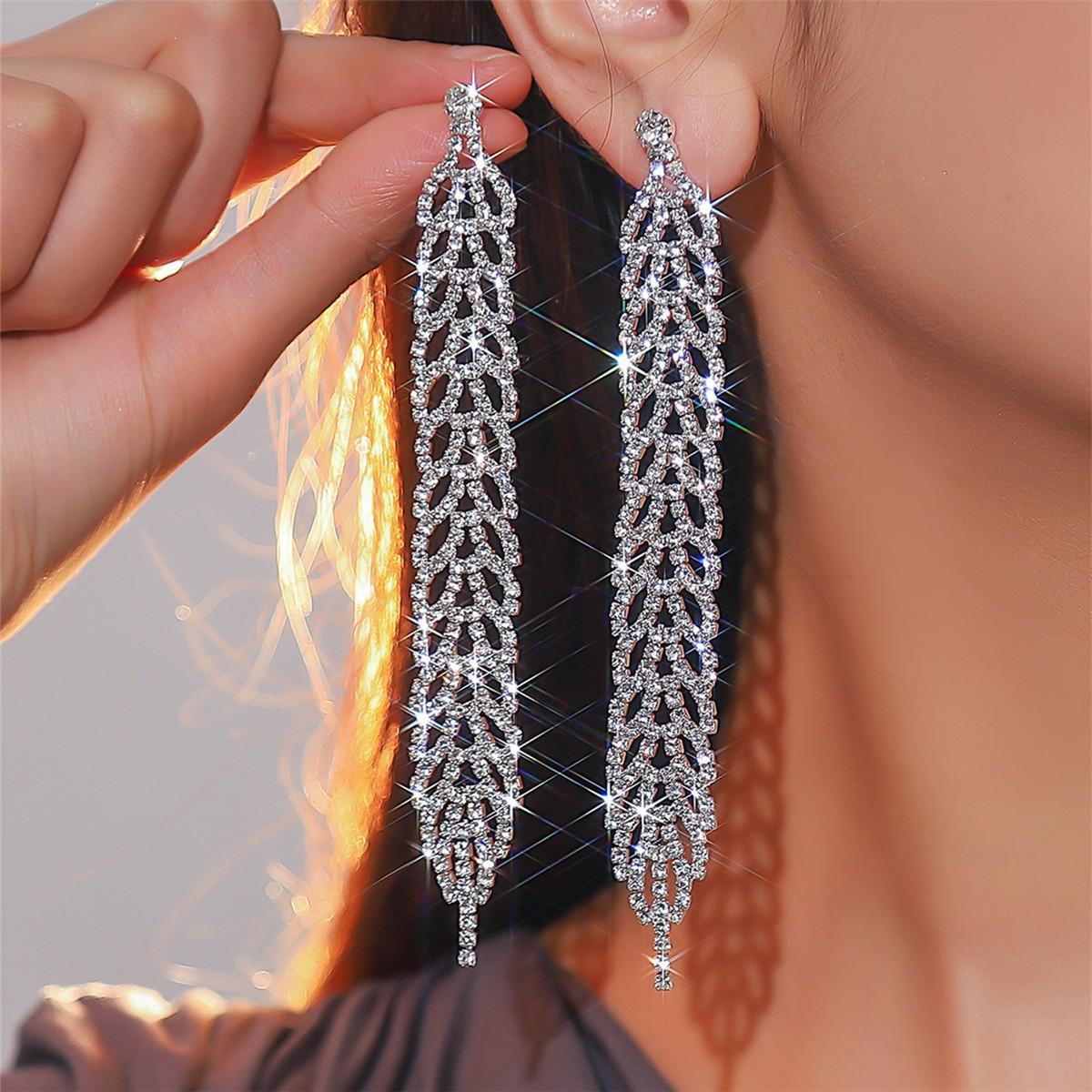 

Temperament Роскошные длинные серьги-листья Блестящие серьги с бриллиантами Элегантные трендовые серьги Ювелирные изделия Женские серьги