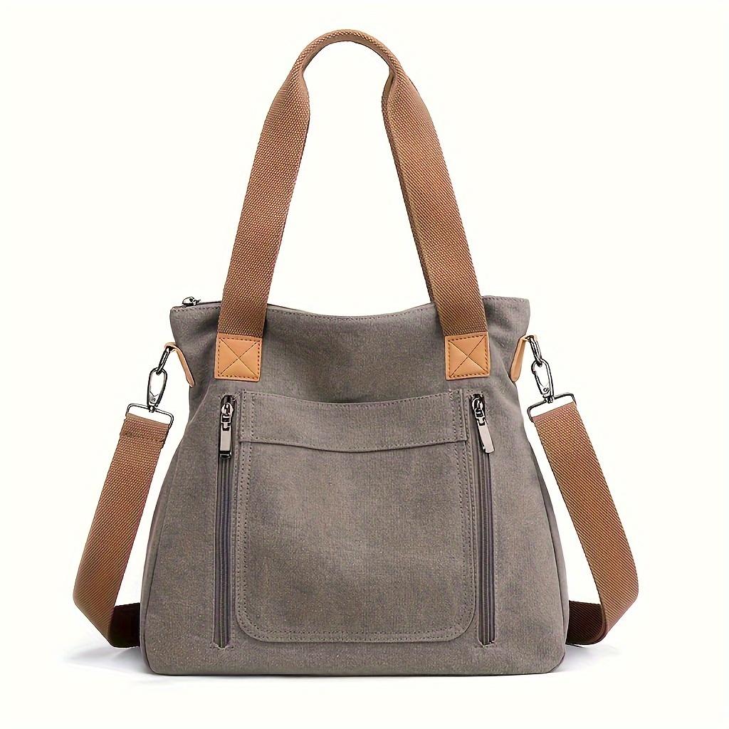 

Women s handbag grey canvas material with multiple pockets, casual and commuter style, crossbody bag with a zipper, large capacity bag