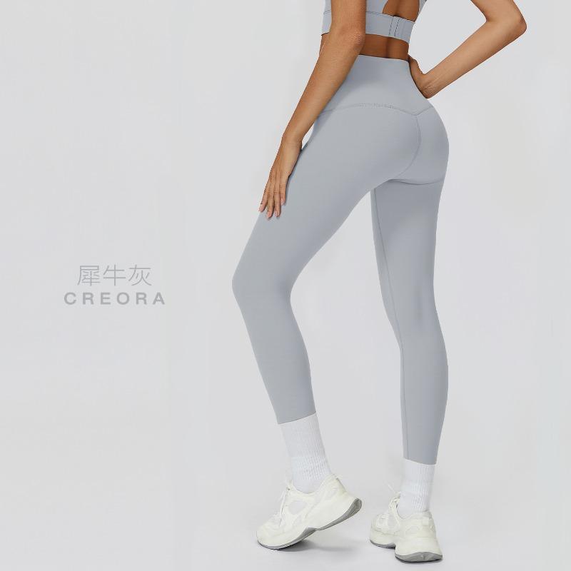 High waist naked nine-point yoga pants, pockets, belly and hips, Pilates fitness pants, and tight sports trousers outside.