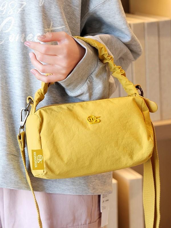 Nylon Waterresistant Bucket Bag For Women With Spacious Interior And Urban Style