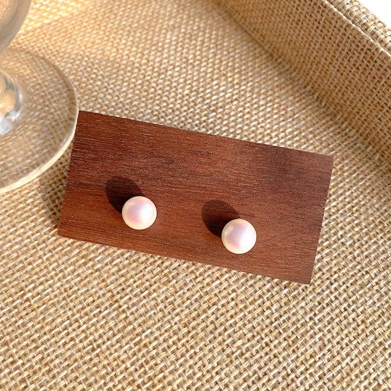 

Серьги-пусеты из жемчуга в форме парового хлеба для женщин, темпераментные серьги в стиле легкой роскоши, новинка 2024 года, необычные, на каждый день, нишевые серьги Pink 8mm