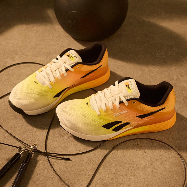 Reebok Nano X5 Chalk Black Electric Amber Unisex Sneakers Yellow 100209367