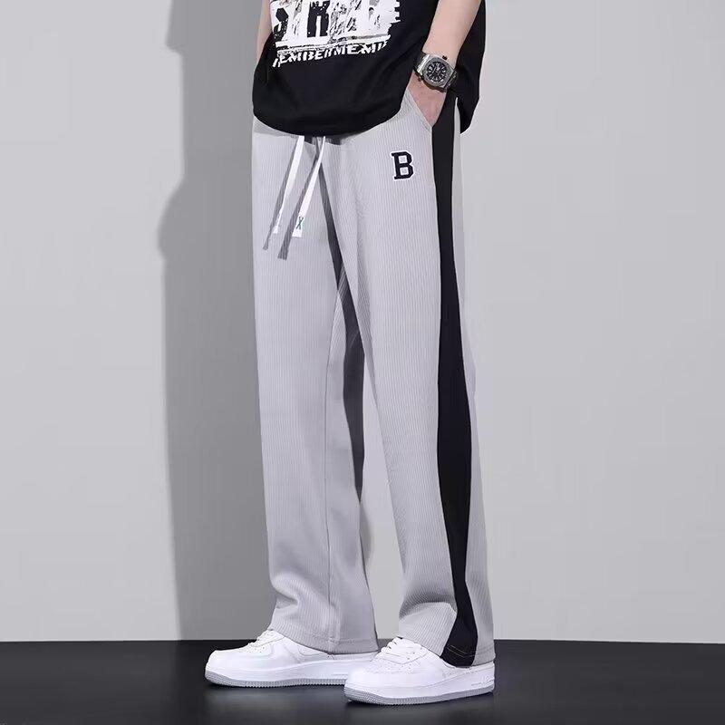 

Мужские летние повседневные белые широкие спортивные штаны - модный свободный крой в уличном стиле L светло-серый