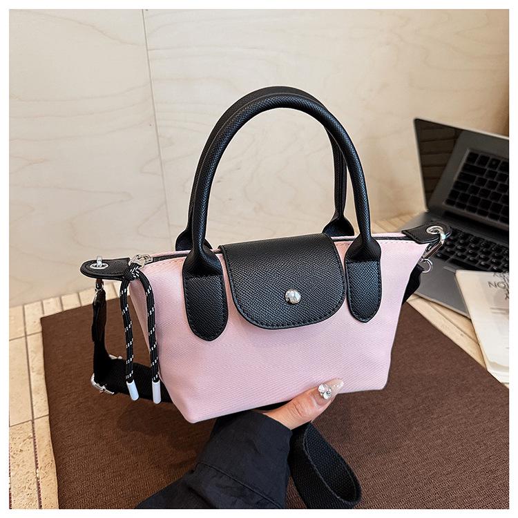 Minimalist Color-Block Oxford Cloth Handbag: Versatile, Fashionable Shoulder Bag with Unique Texture.