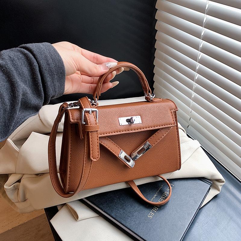 2025 neue Internet-Promi-Tasche Nische Schulter Umhängetasche Premium Koreanische Version tragbare kleine quadratische Tasche klassische Kelly-Tasche