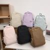 Schoolbag new large-capacity high-value junior high school student casual schoolbag Japanese and Korean version solid color fashionable simple 