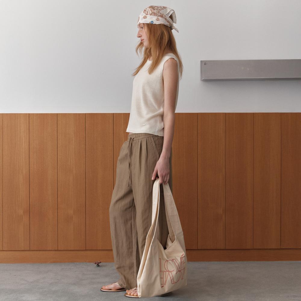 Elssibeui Diagonal Buttons Sleeveless Knit_Ivory