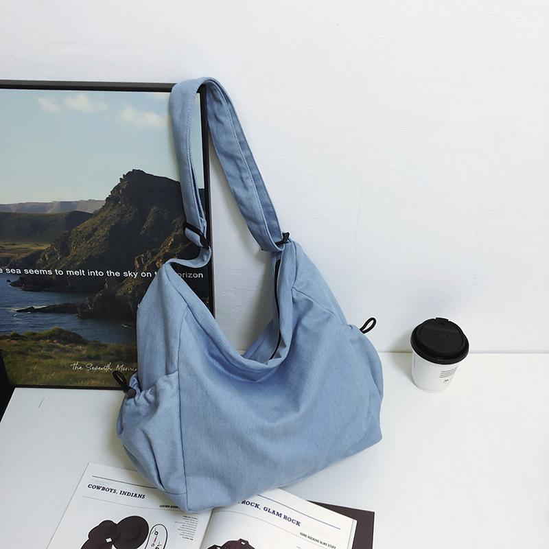 New tote bag fashion shoulder bag men and women the same messenger bag large capacity casual travel bag versatile women's bag tide