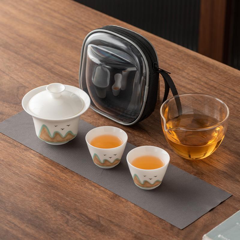 

Suet jade porcelain high-end travel tea set portable set one pot and two cups company annual meeting leaders father teacher gifts