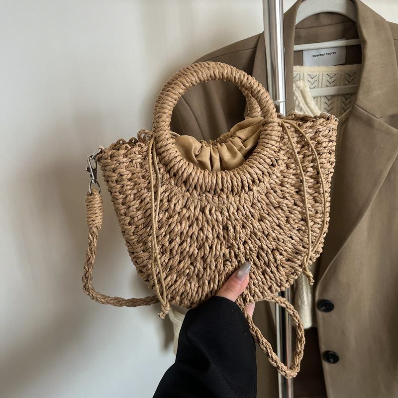 Woven straw bag women's 2025 new niche design high-end messenger bag seaside popular portable tote bag