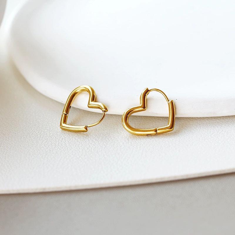 Korean Style Titanium Heart Earrings: Chic, Versatile, Celebrity-Endorsed Design.