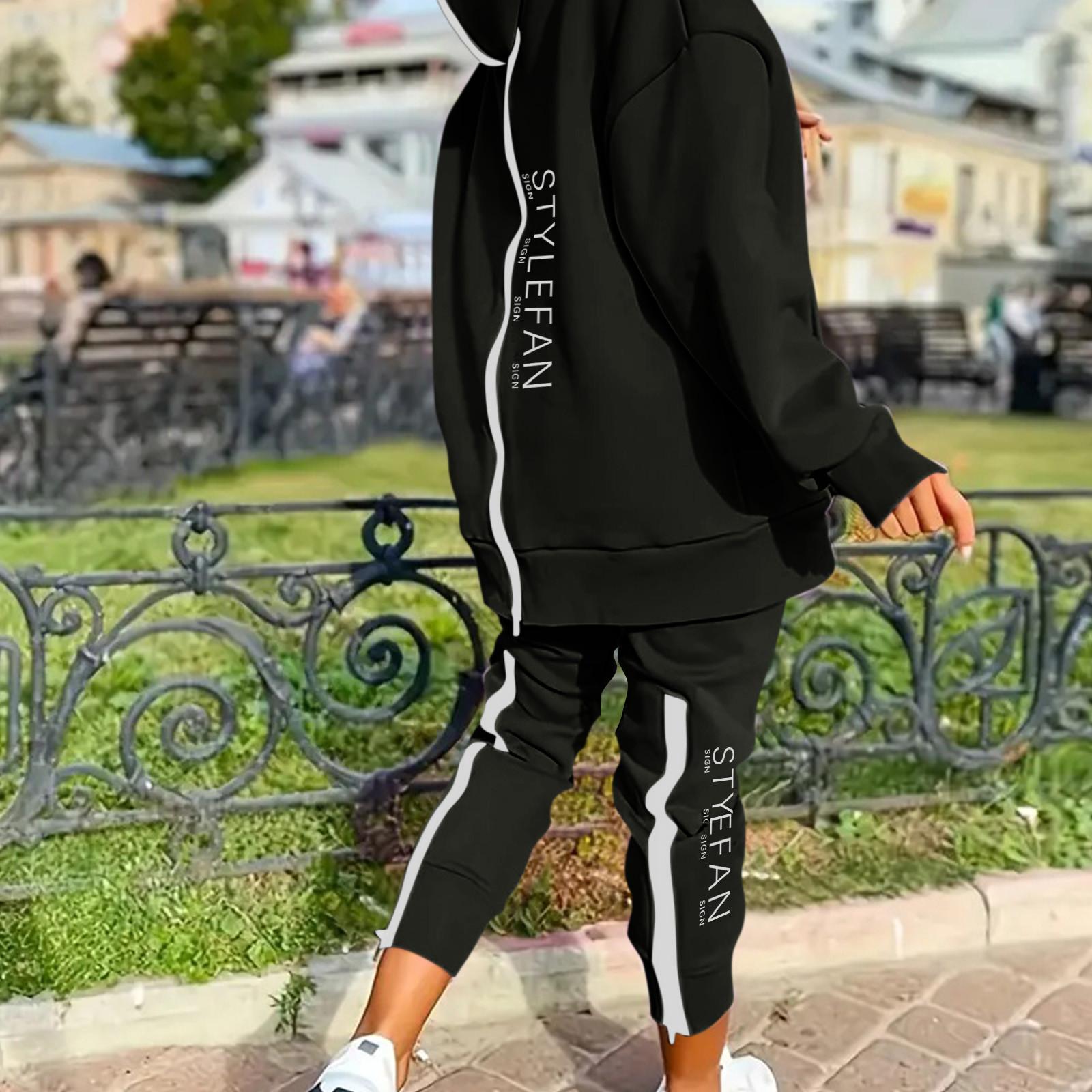 

Женский комплект из двух предметов с длинными рукавами, длинными брюками и капюшоном на молнии L чёрный
