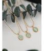 French Retro Clavicle Chain Necklace: 18k Gold-Plated Titanium Steel with Cat's Eye Oval Pendant for Women
