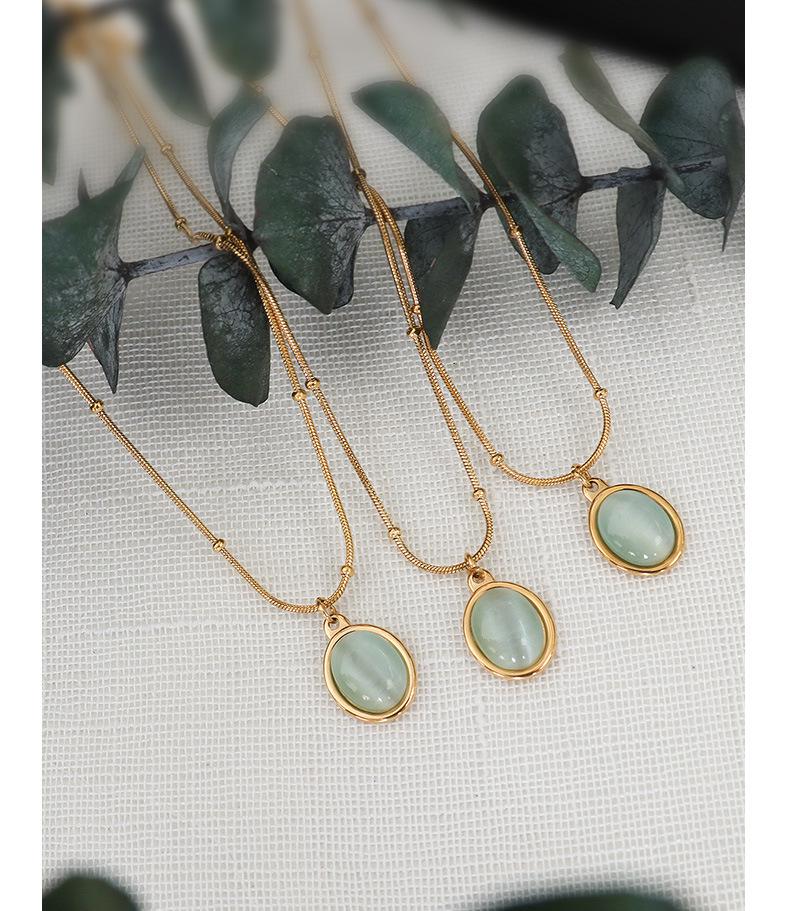 French Retro Clavicle Chain Necklace: 18k Gold-Plated Titanium Steel with Cat's Eye Oval Pendant for Women
