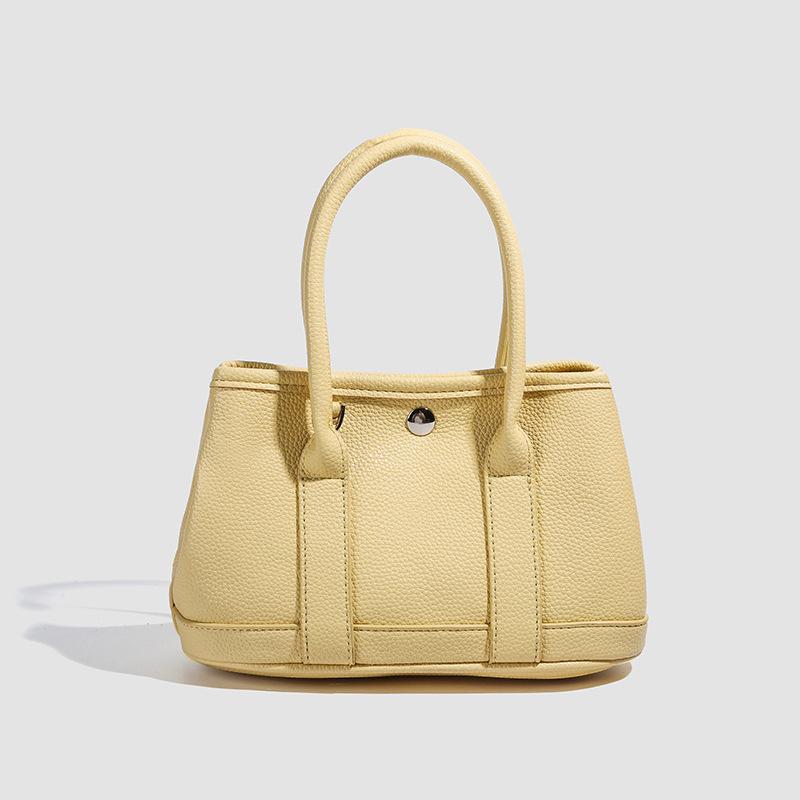 Casual Simple Small Bag Women's New Spring Niche Design Fashion Trend Shoulder Messenger Bag Bucket Bag