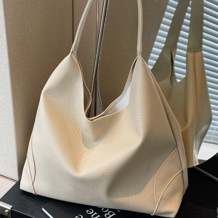 2025 Autumn and Winter New Korean Version Temperament Fashionable Large Capacity Soft Leather Underarm Shoulder Bucket Commuter Tote Bag Women