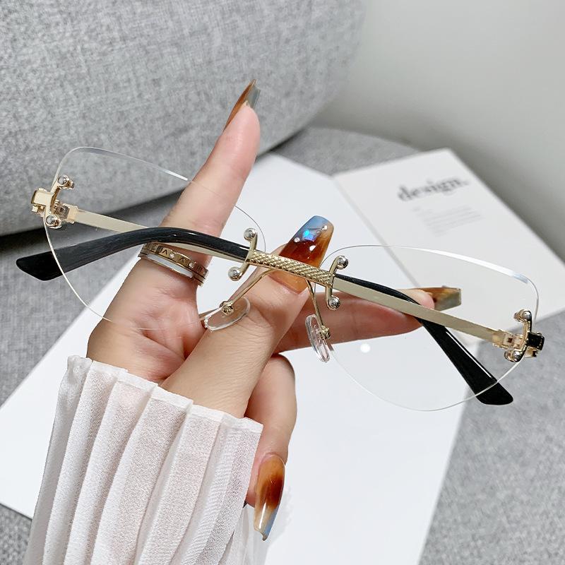 

Punk Vintage Cat Eye Rimless Sunglasses Women For Men Luxury Brand Designer Sun Glasses Popular Metal Rivet Hip Hop Shades Uv400