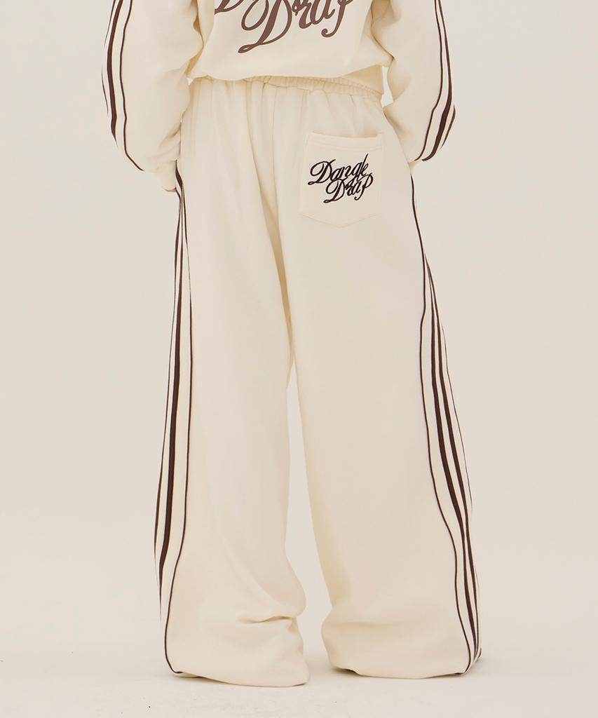 DANGLEDROP Dgdp Lettering Low-Rise Wide Track Pants_Ivory