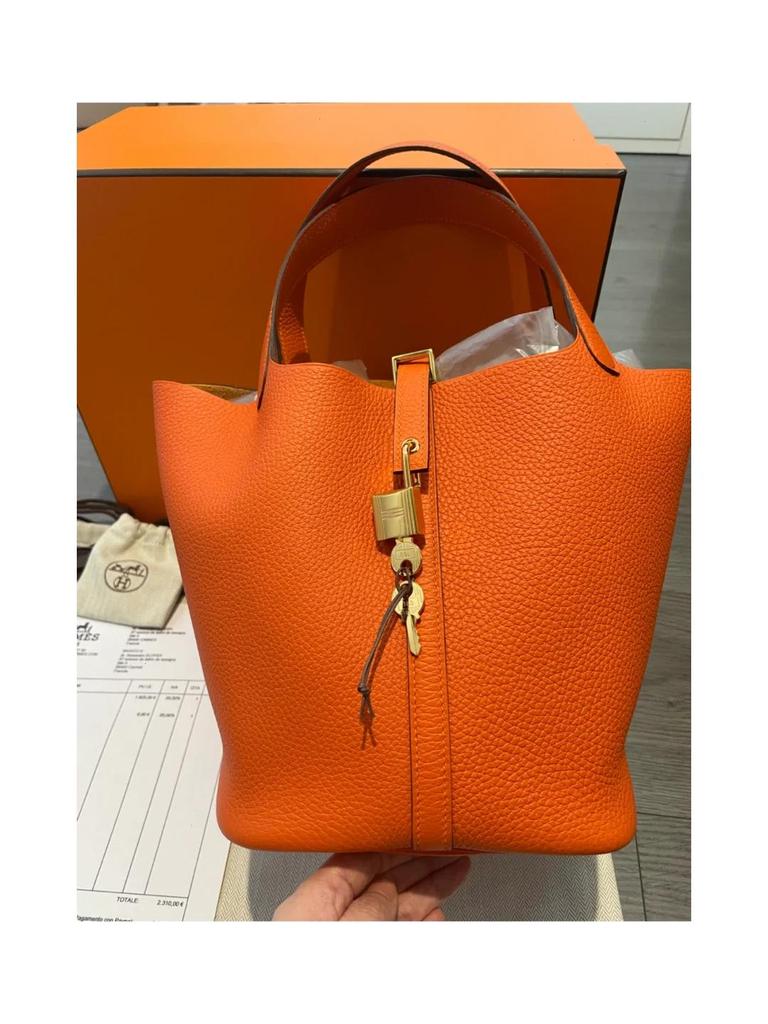 Bolso de Mano para Mujer con Grano de Lichi: Bolso Cubo Versátil, de Alta Gama y de Moda 2025