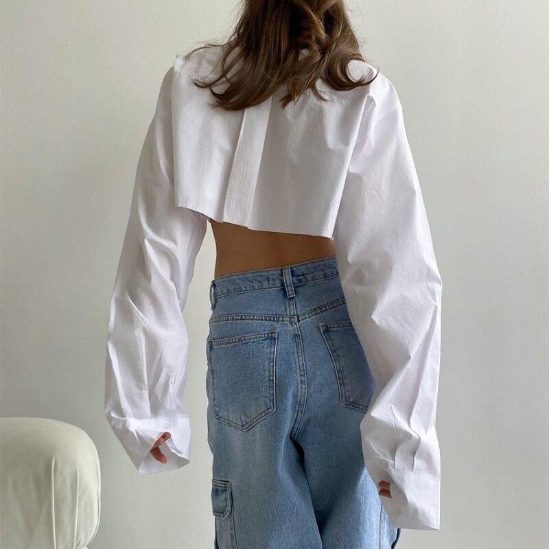 Vit Skjorta Dam 2023 Höst Mode Asymmetrisk Sömnad Ficka Korta Toppar Sexig Exponerad Navel Blus Vardagskläder 28626