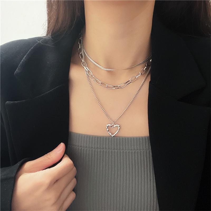 Schicke unregelmäßige herzförmige Engelsflügel-Mehrschichtkette für stilvolle Sommeroutfits