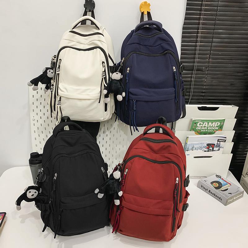 Ryggsäck för män i enfärgat utförande Ryggsäck för kvinnor med flera fickor Stor kapacitet Student Skolväska