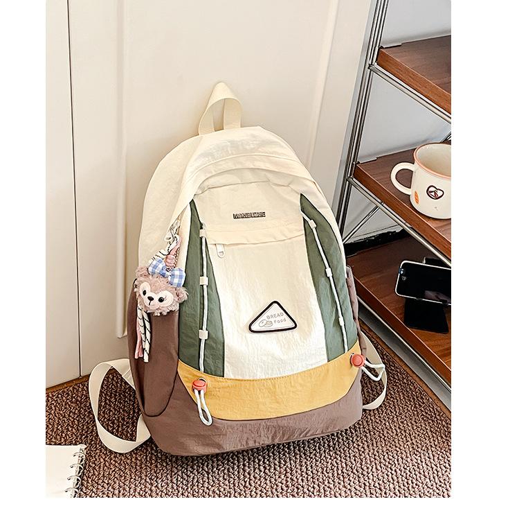 Simple schoolbag, Korean contrasting colors, new schoolbag, light travel and leisure backpack, high value, dirt-resistant