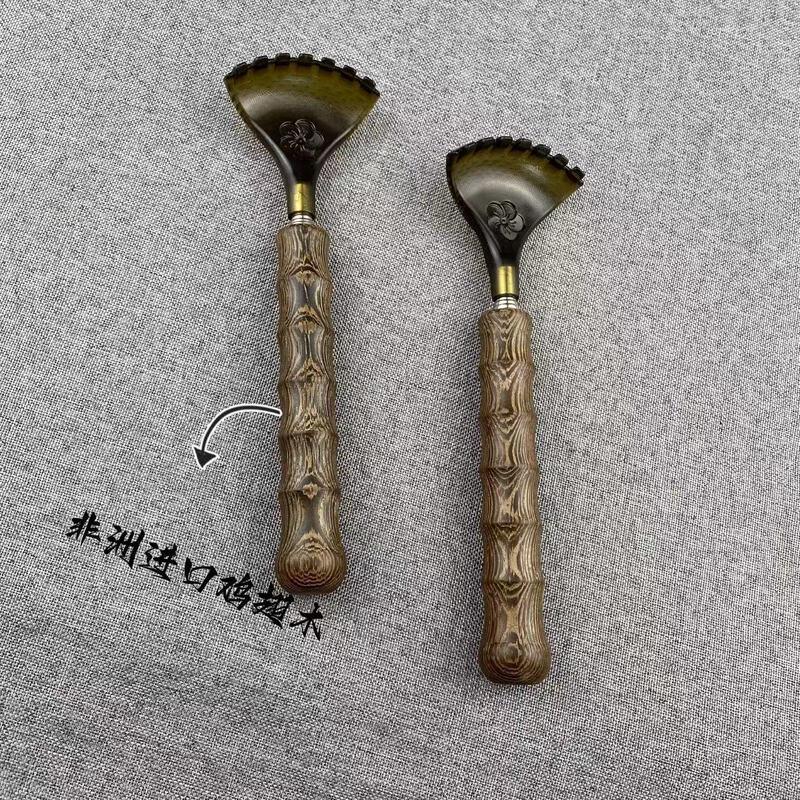 Ausziehbarer Wengeholz-Rückenkratzer