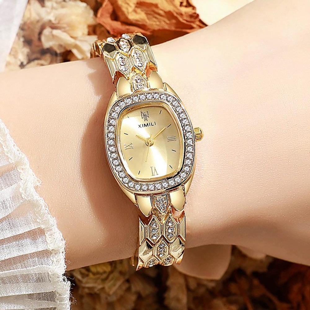 Moderne Damen Armbanduhr mit Strasssteinen und Quarzwerk, oval beige