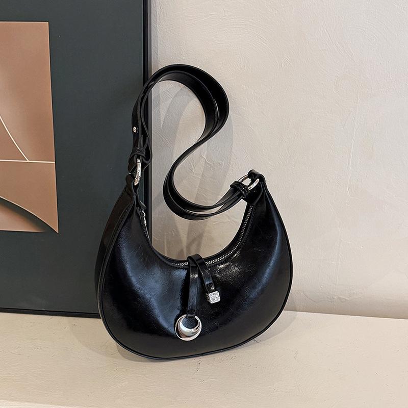 Simple and fashionable shoulder handbag 2025 spring new niche high-end commuter underarm bag Korean crescent bag